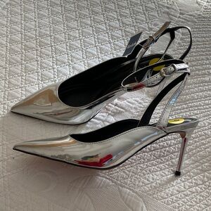 Jessica Simpson style silver patent sling back heels. Size9